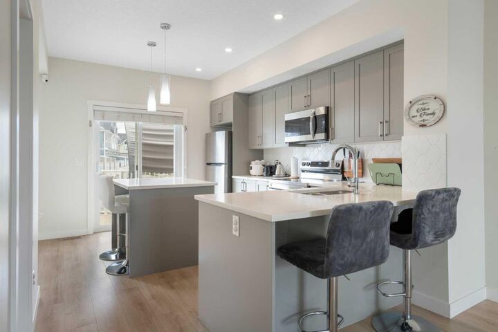 Property Photo:  240 Copperleaf Way SE  AB T2Z 5G2