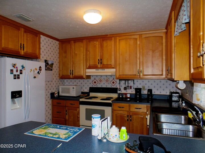 Property Photo:  8126 Mittie Avenue  FL 32404 