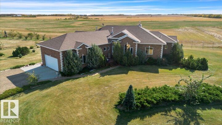 Property Photo:  24703 Meridian Street NE  AB T5Y 6E8