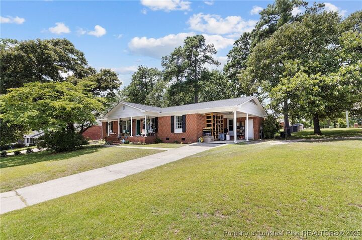 Property Photo:  411 Lotus Drive  NC 28303