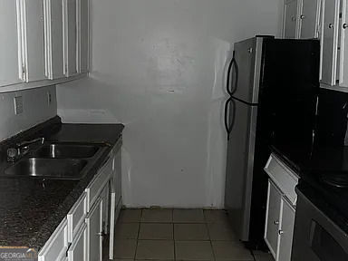 Property Photo:  1505 Camelot Drive  GA 30349