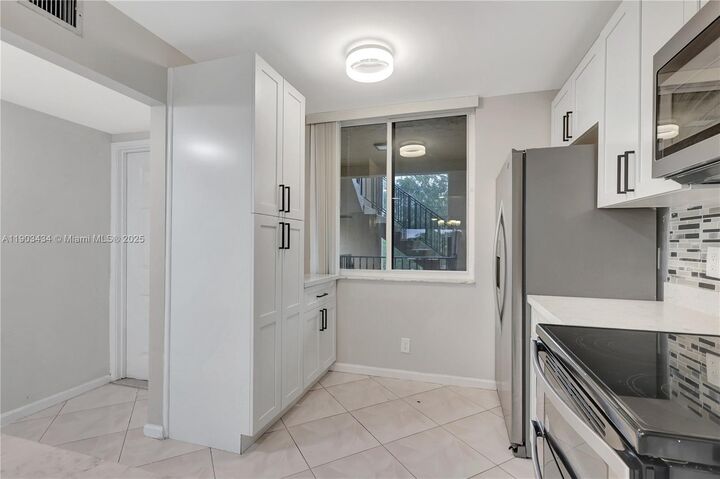 Property Photo:  8592 W Sunrise Blvd 317  FL 33322