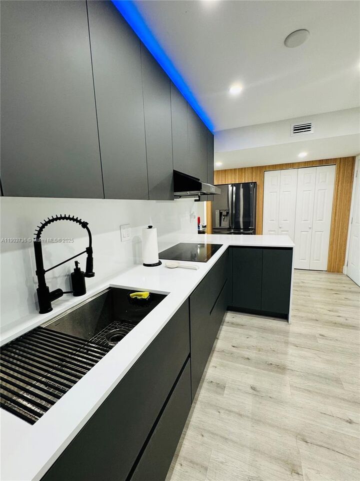 Property Photo:  1555 W 44th Pl 214D  FL 33012