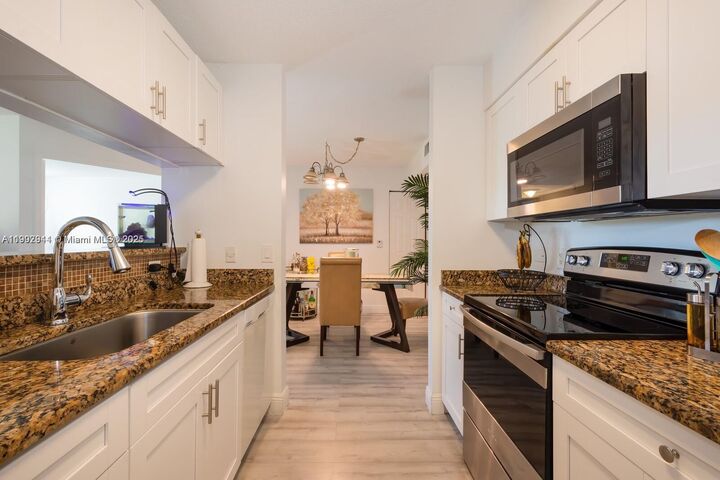 Property Photo:  12160 Saint Andrews Pl 108  FL 33025