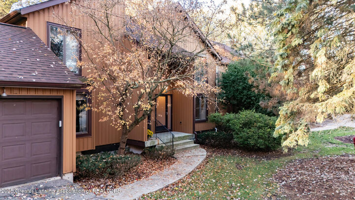 Property Photo:  1864 Burrwood Circle  MI 48823