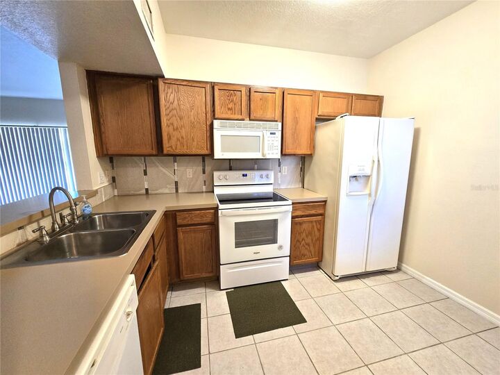 Property Photo:  9521 Newdale Way 101  FL 33578 