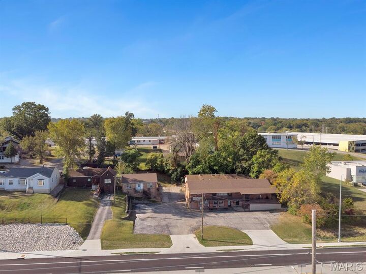 Property Photo:  8950 Natural Bridge Road  MO 63121