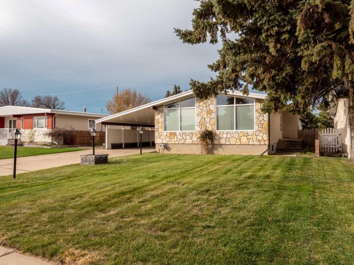 Property Photo:  5906 55 Street  AB T1G 1K3 