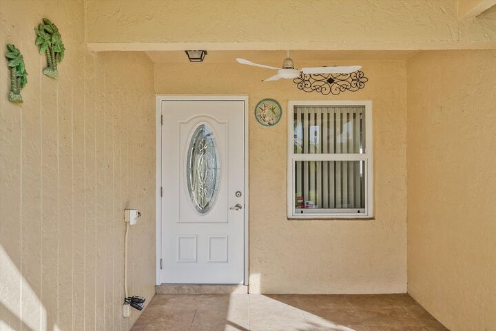 Property Photo:  13614 Cord Way  FL 33484