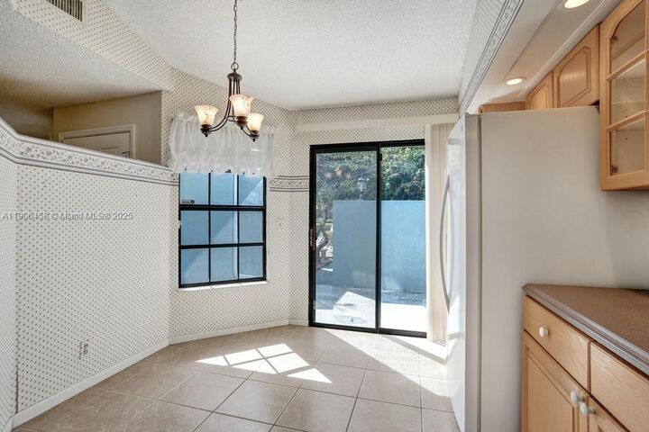 Property Photo: 8465 Waterford Cir FL 33321