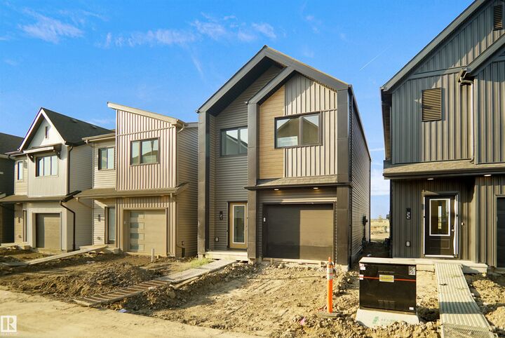 Property Photo: 1430 Aster Way NW 21 AB T6T 2N8