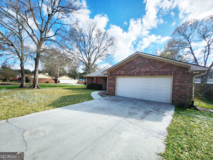 Property Photo:  157 W Peach Avenue  GA 31548 