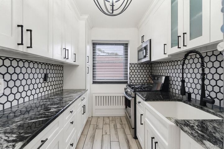 Property Photo:  81-24 156th Avenue 240-Cu  NY 11414 