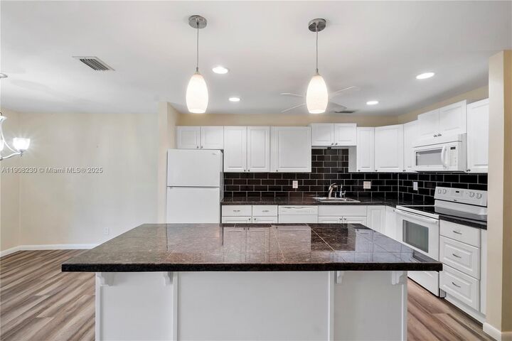 Property Photo: 1022 NW 88th Ave C100 FL 33322