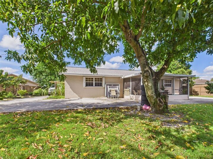 Property Photo:  301 NW 83rd Way  FL 33024 