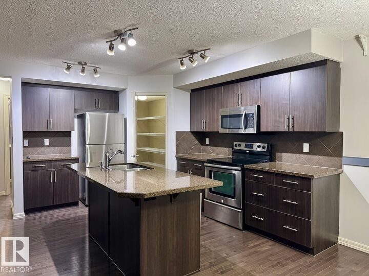 Property Photo:  125 Calvert Wynd  AB T8L 0E5 