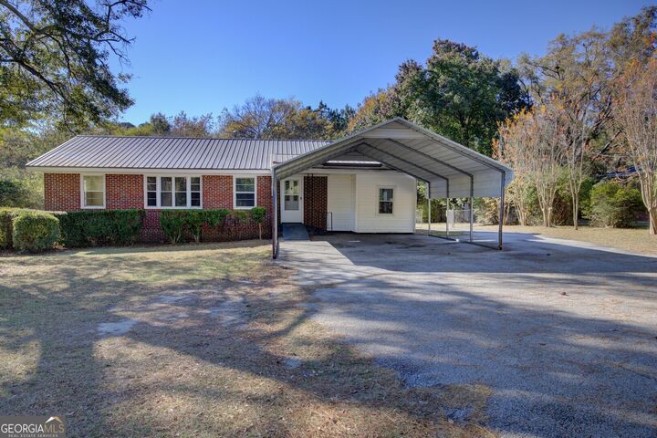 Property Photo:  9174 Flat Shoals Road  GA 30014 