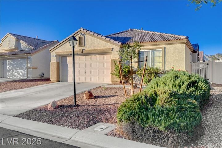 Property Photo:  606 Regal Robin Way  NV 89084 