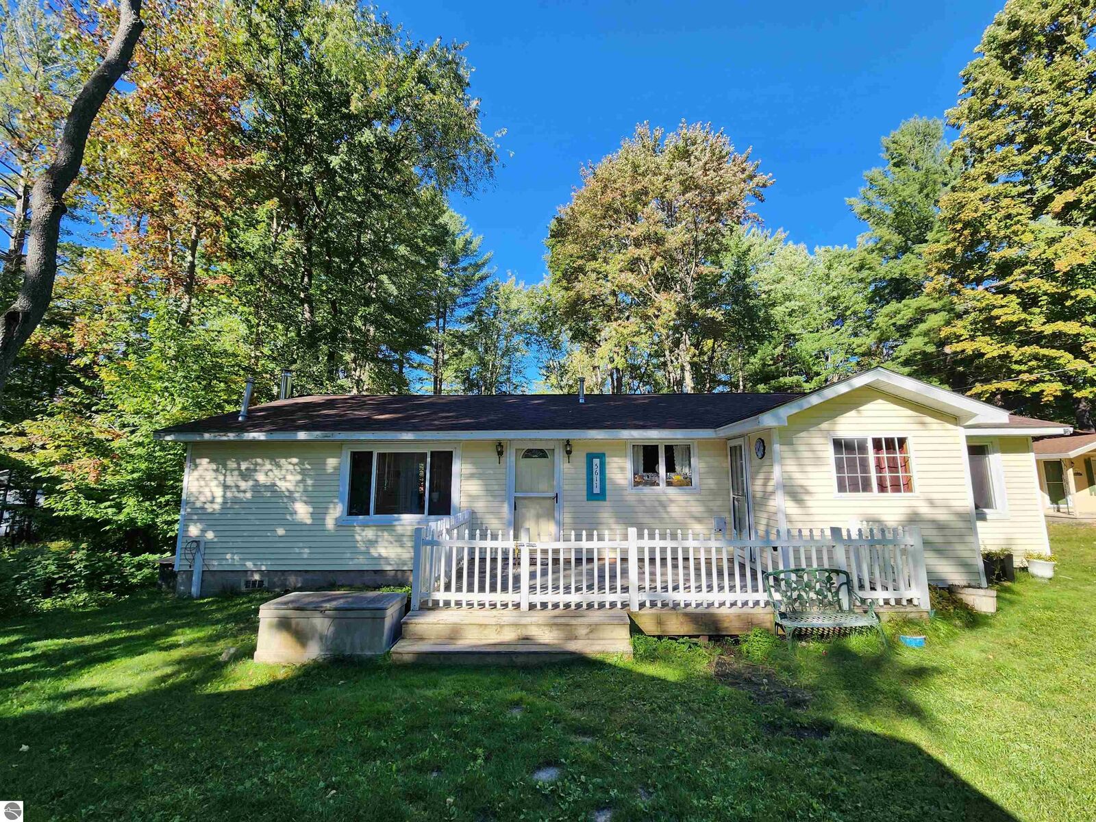 Property Photo:  5611 NE East Shore Drive  MI 49646 