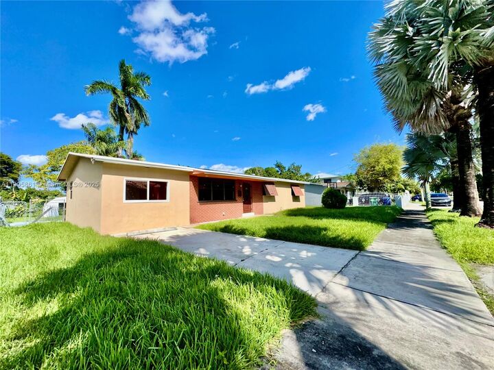 Property Photo: 51 NW 161st St FL 33169