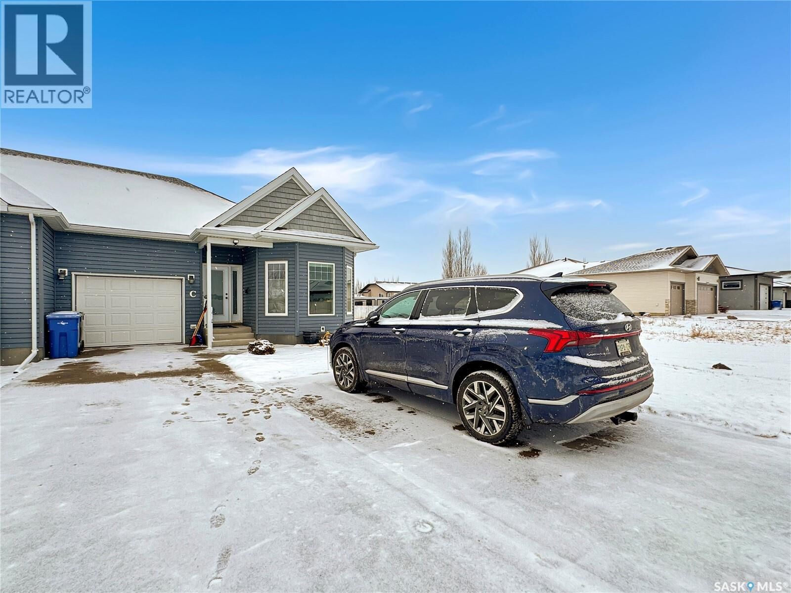 Property Photo:  C 2301 Amos Drive  SK S9A 1B6 