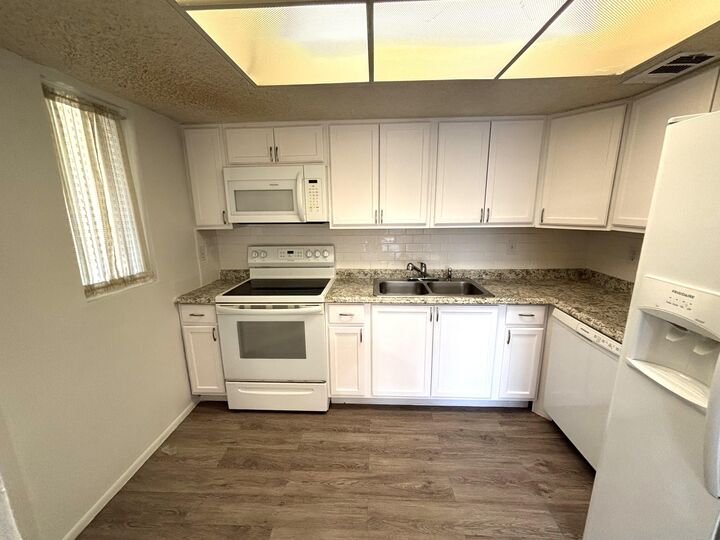 Property Photo:  1552 SE Royal Green Circle 201  FL 34952 