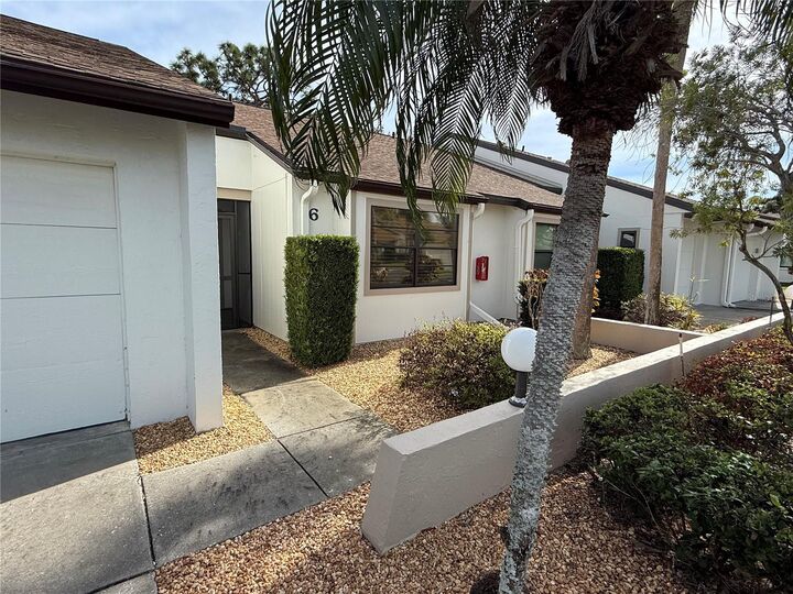 Property Photo:  1211 Capri Isles Boulevard 6  FL 34292 