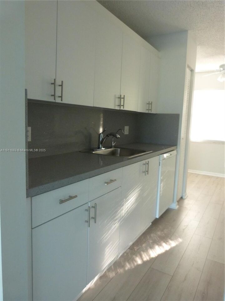 Property Photo:  1151 SW 128th Ter 312D  FL 33027 