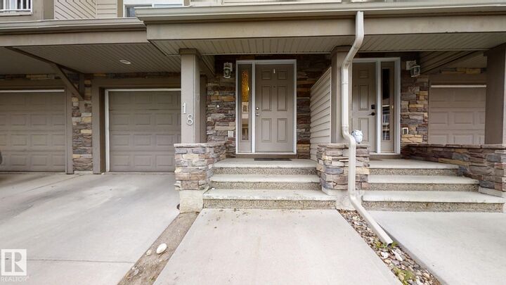 Property Photo: 12050 17 Avenue SW 18 AB T6W 1X4
