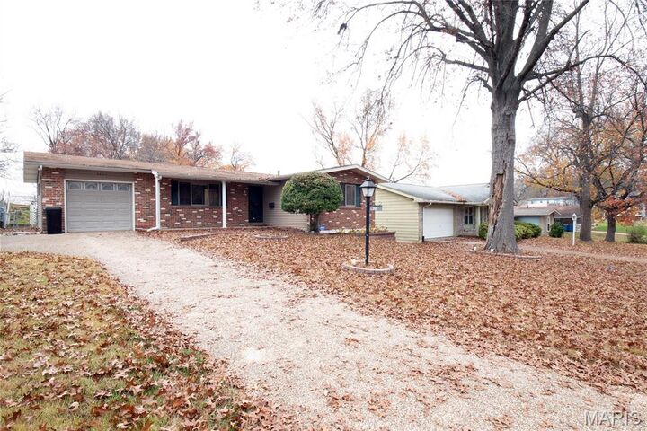 Property Photo: 8827 Sumter Drive MO 63136