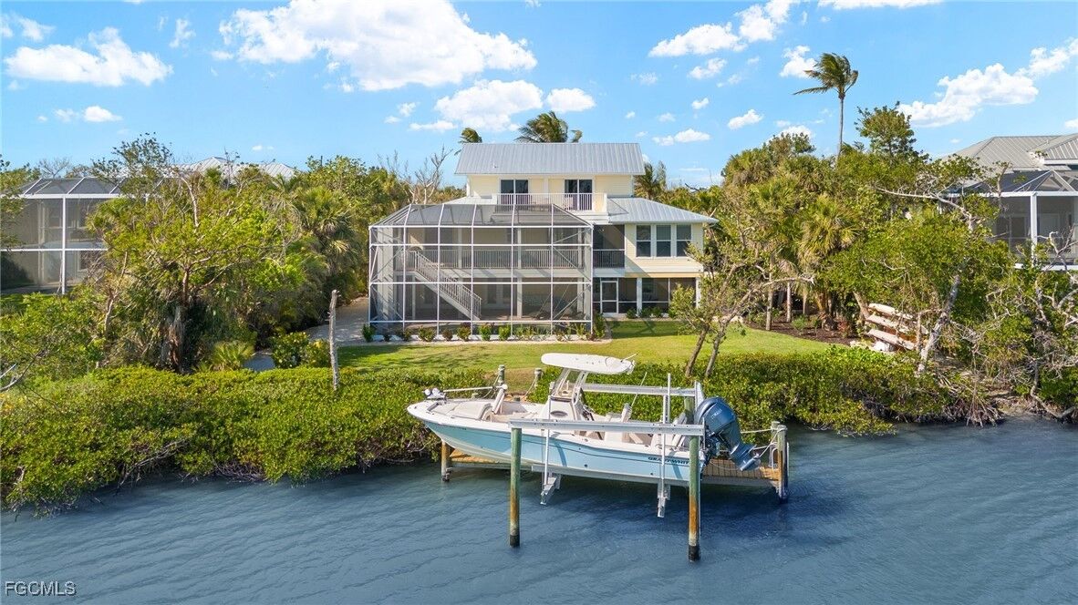 Property Photo:  2391 Shop Road  FL 33957 