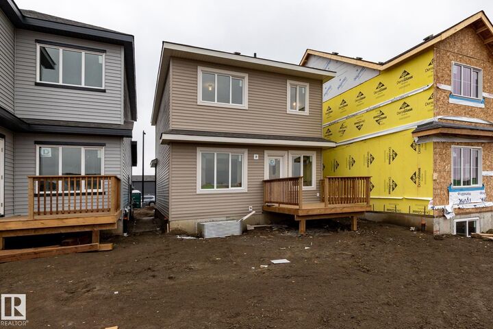 Property Photo:  20972 22 Avenue NW  AB T6M 3H7 