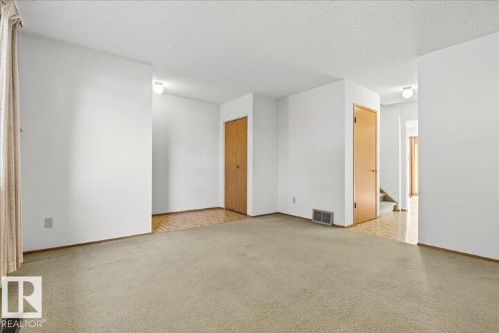 Property Photo:  5712 188 Street NW  AB T6M 2A5 