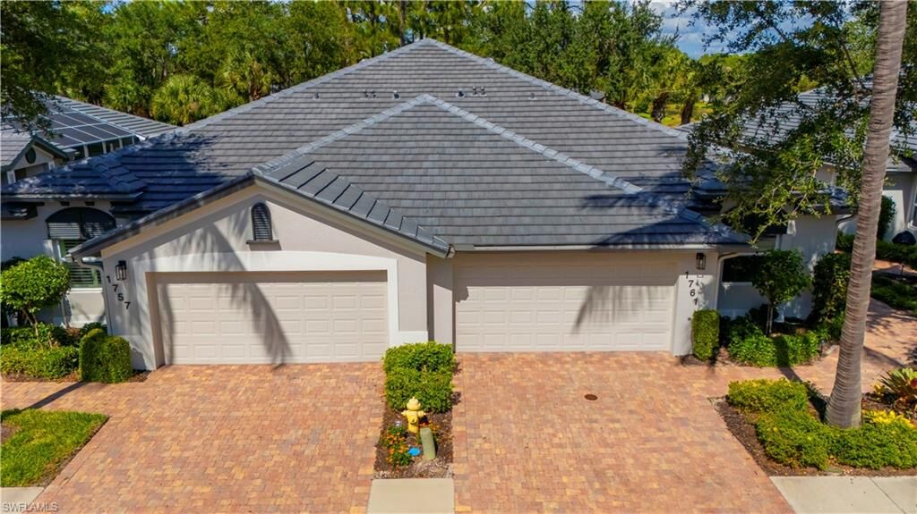 Property Photo:  1761 Tarpon Bay Dr S 58  FL 34119 