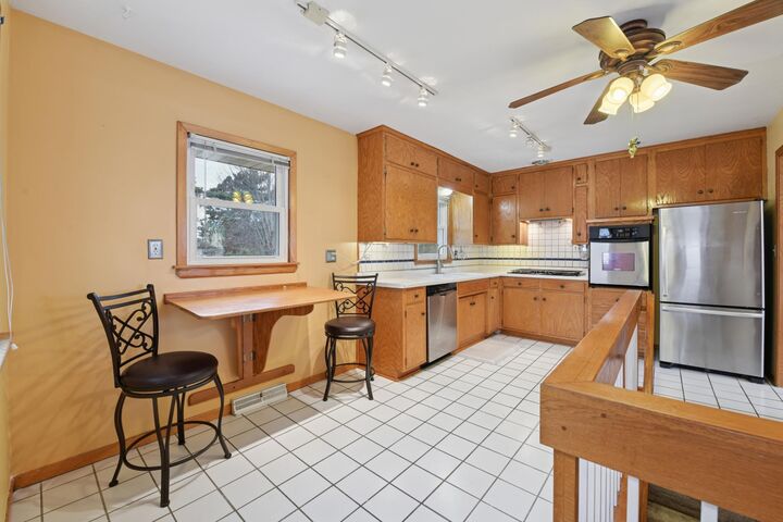 Property Photo:  6938 Booth Avenue  MN 55076 