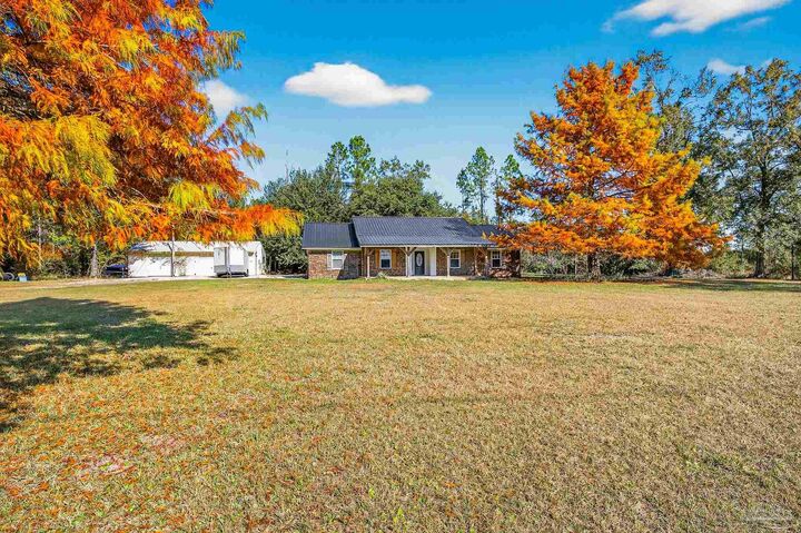 Property Photo:  10210 S Pineville Rd  FL 32568 
