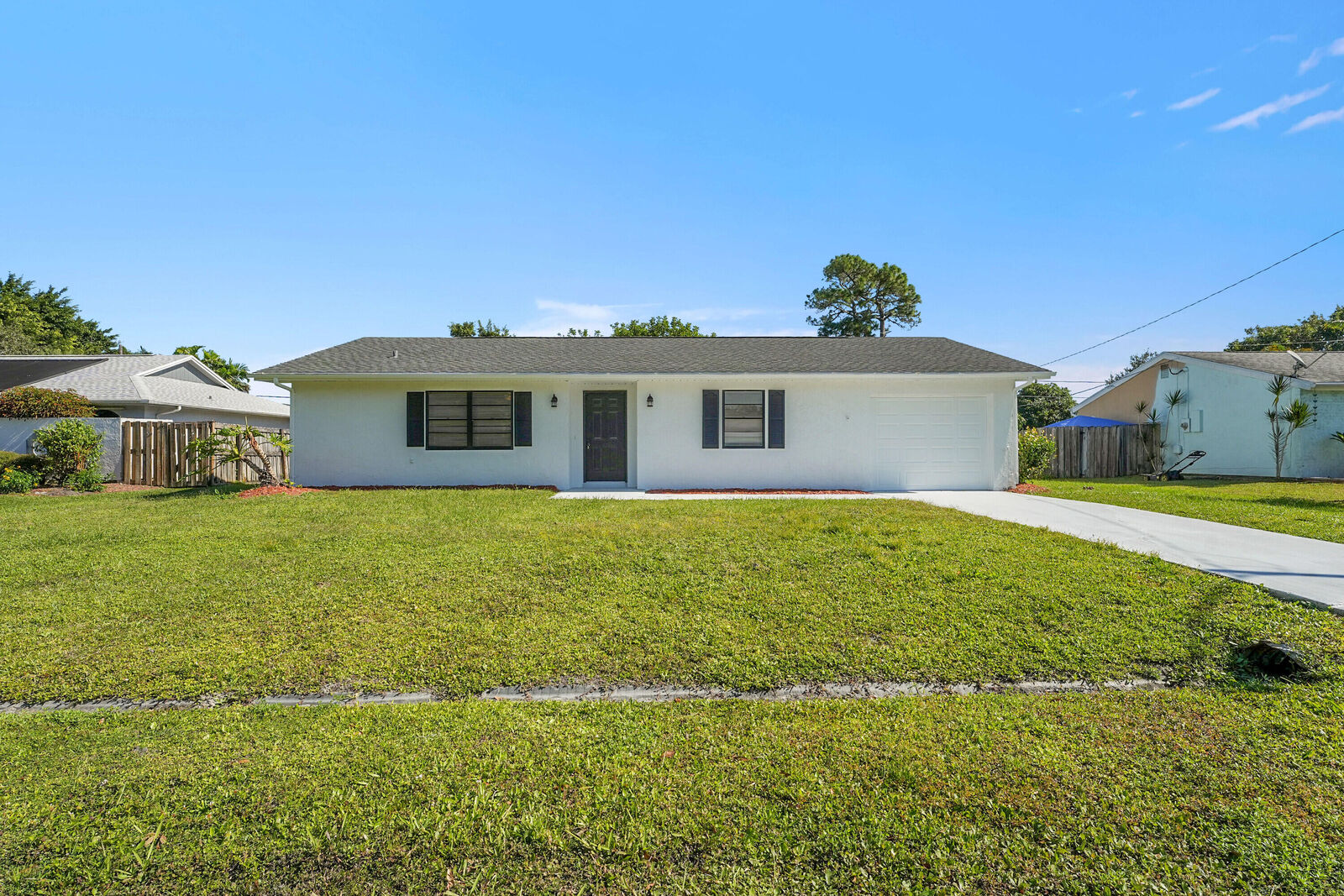 Property Photo: 2251 SE Holland Street FL 34952