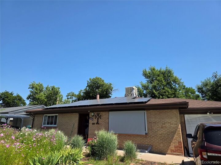 Property Photo:  1666 S Depew Street  CO 80232 