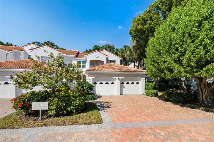 Property Photo:  8410 Excalibur Cir A7  FL 34108 