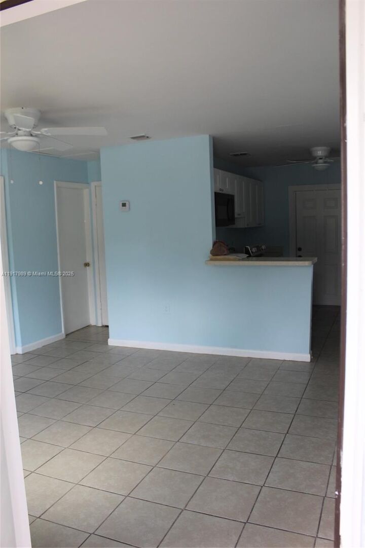 Property Photo: 5050 SE Ebbtide Ave FL 34997