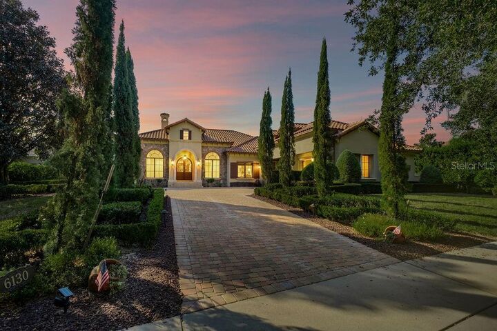 Property Photo: 6130 Grosvenor Shore Drive FL 34786