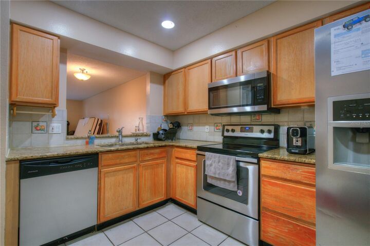 Property Photo:  13313 Fairway Glen Drive 103  FL 32824 