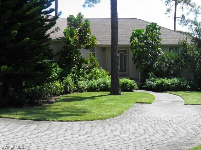 Property Photo:  15922 Delasol Lane  FL 34110-2809 