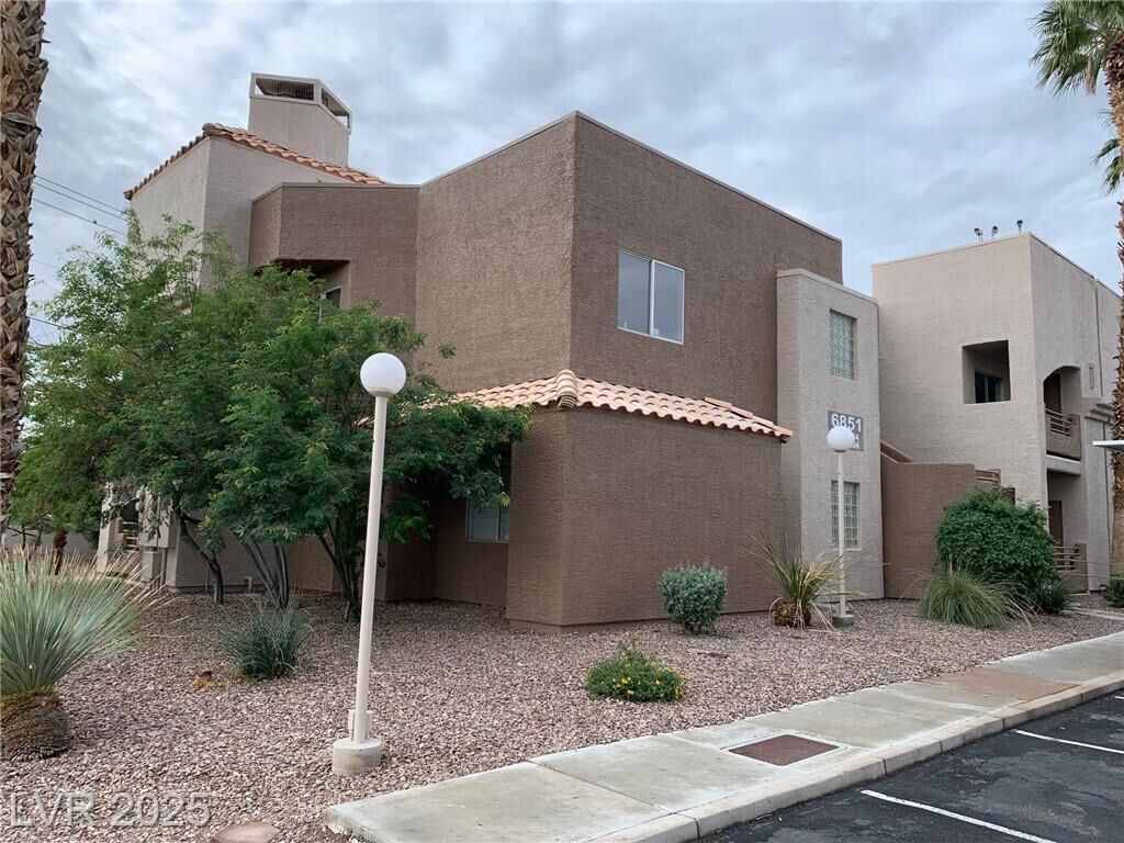 Property Photo:  6851 Tamarus Street 101  NV 89119 