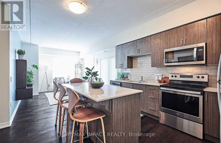 Property Photo:  290 Liberty Street North 209  ON L1C 3K6 