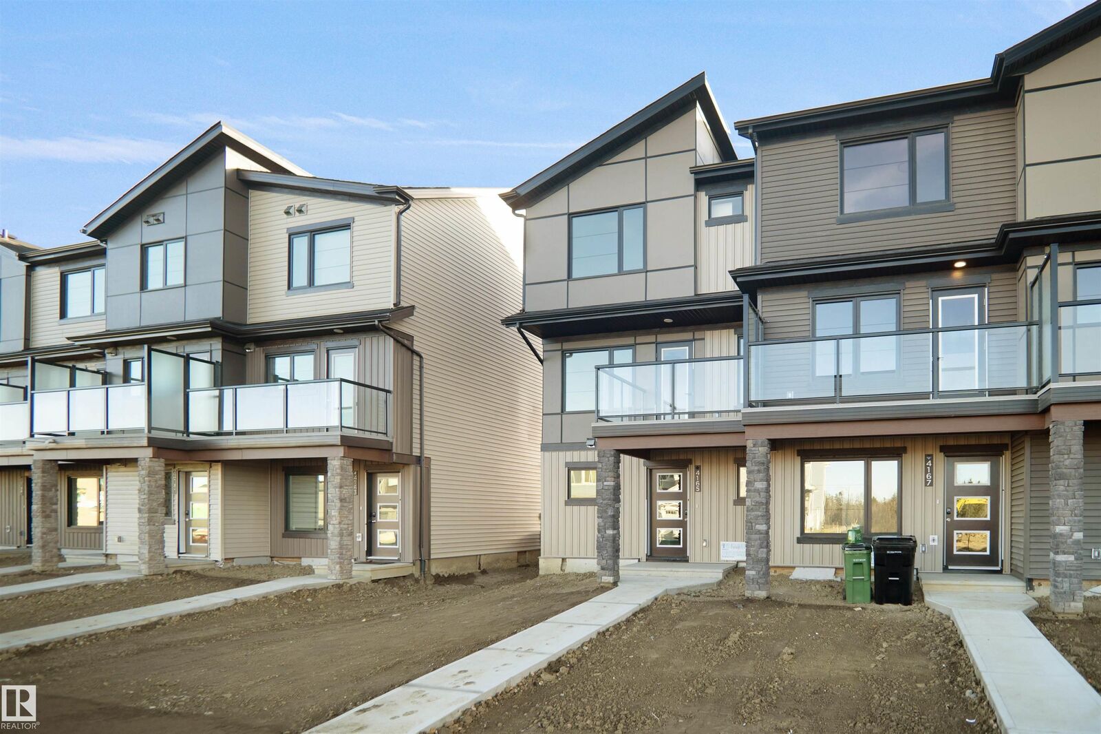 Property Photo:  100 Ficus Way  AB T8L 0Z6 