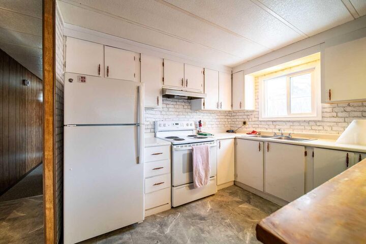 Property Photo: 513 2 Avenue Crescent AB T9W 1A3