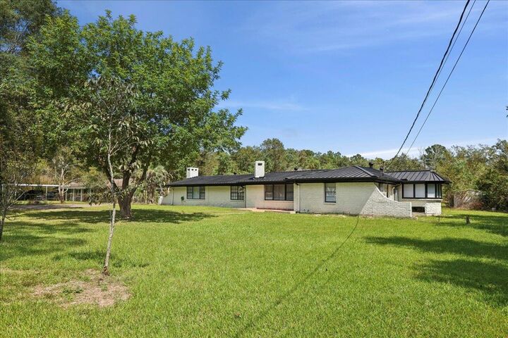 Property Photo: 3408 Lawn Oak Dr TX 77632
