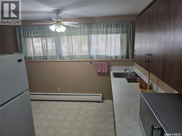 Property Photo:  Abcd 201 King Street  SK S0A 3C0 