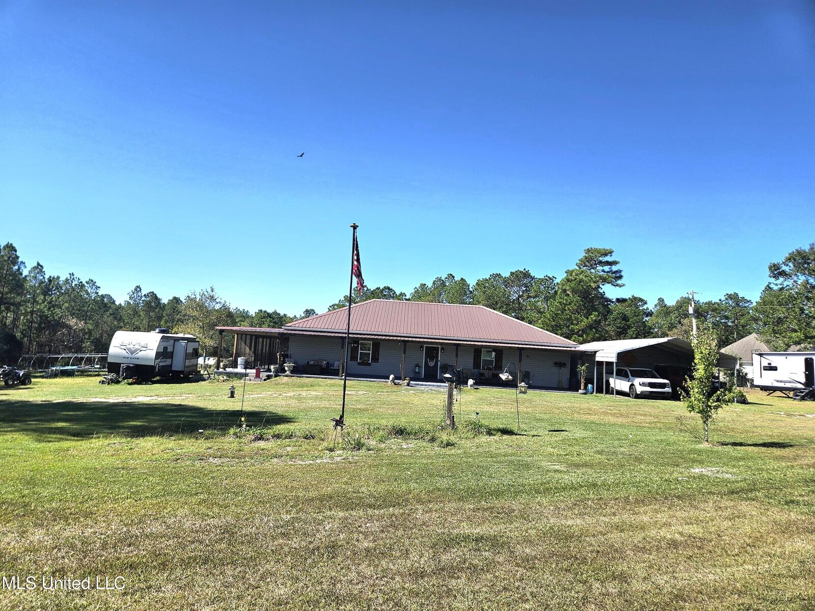 Property Photo: 27588 E Lake Cypress Dr Drive MS 39573